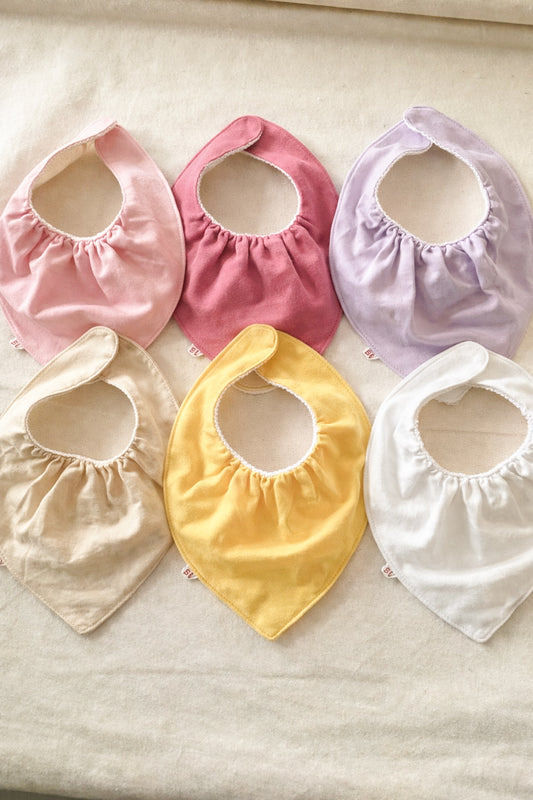 Babero bandana impermeable para bebé tonos rosados